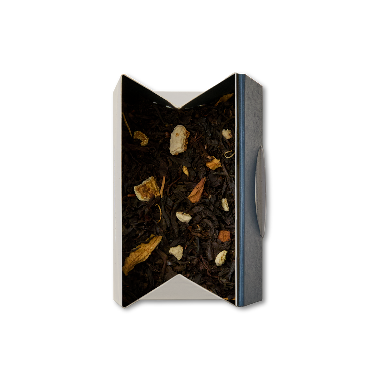 An open box of Orange Blossom Loose Leaf Tea viewed from above, revealing a blend of black tea mixed with dried fruit, orange blossom, and herbs inside. The white box features a dark-colored side panel and a partially visible flap on the right.