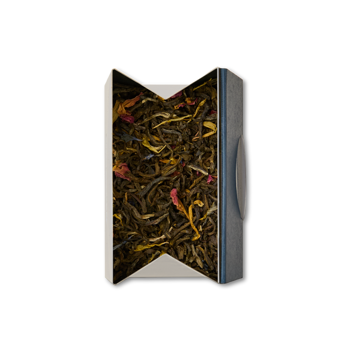 A top-down view of an open, rectangular box filled with Extravagant Earl Grey Loose Leaf Tea—an enticing blend of green and brown leaves interspersed with small pieces of red and yellow petals, offering a delightful assortment that hints at aromatic white earl grey tea with notes of vanilla bergamot.