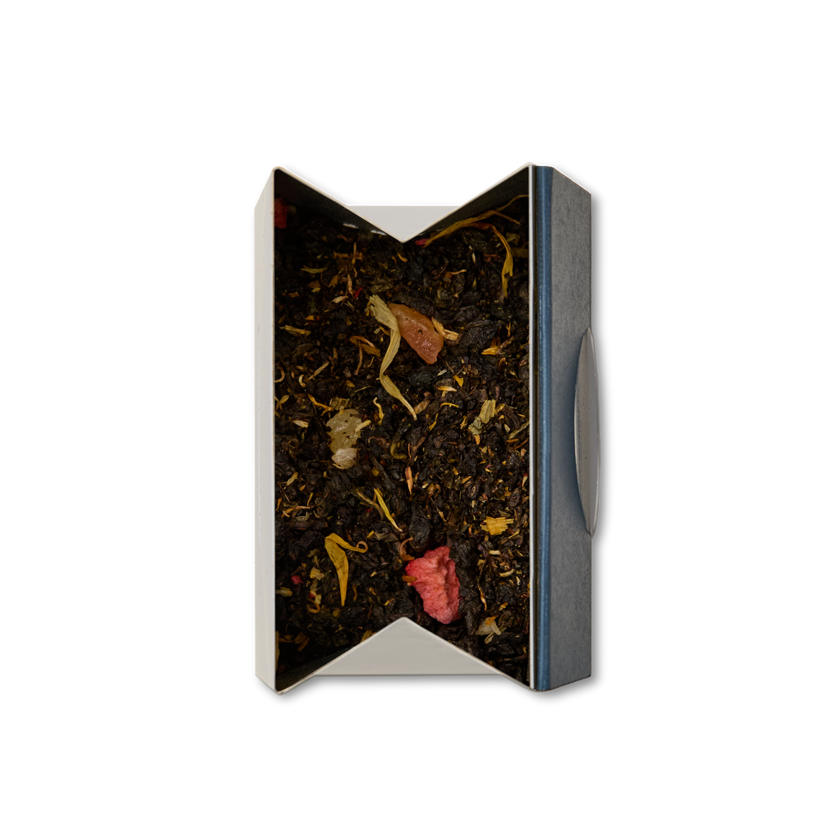 A rectangular box of Garden Party Oolong Loose Leaf Tea, viewed from above on a white background, with the blend visible inside—dried black leaves mixed with colorful pieces like red and yellow petals.