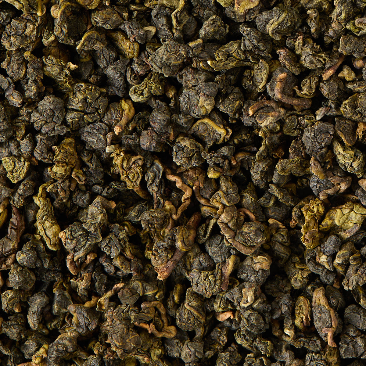 A close-up view of Jade Oolong Loose Leaf Tea, highlighting its tightly rolled leaves with a dark green and brown appearance.
