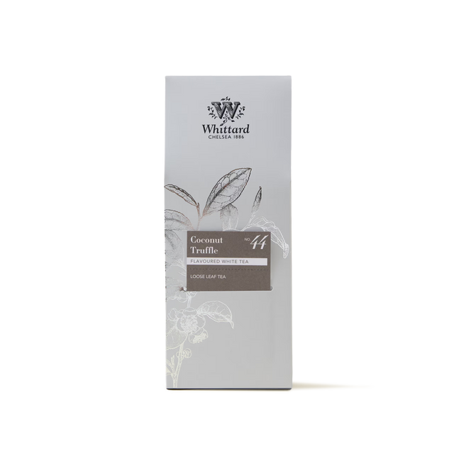 A silver Whittard of Chelsea box labeled Coconut Truffle Loose Leaf Tea, featuring loose leaf tea with a subtle illustration of tea leaves and elegant branding.