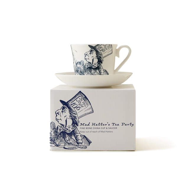 Presenting the Alice in Wonderland Cup and Saucer, a whimsical tea set adorned with an enchanting illustration of the Mad Hatter, inspired by Lewis Carroll’s beloved tale. Beautifully packaged in a matching box labeled “Mad Hatters Tea Party” with coordinating artwork and fine bone china description, this charming set is perfect for adding magic to your next tea party adventure.