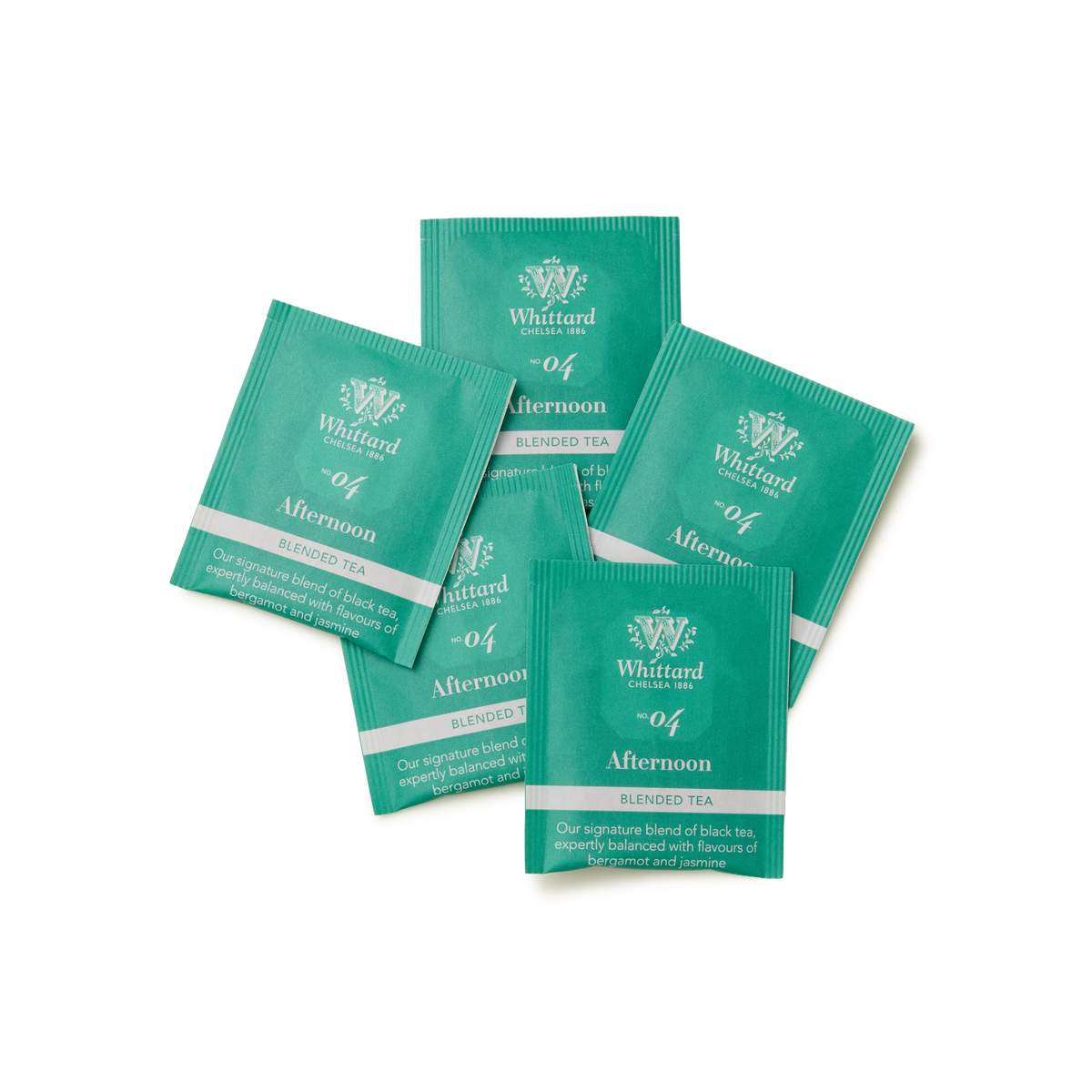 Five green sachets of Tea Discoveries Afternoon Tea 25 Individually Wrapped Teabags are arranged overlapping each other on a plain white background.