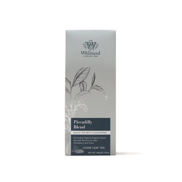 A grey packet of Whittard of Chelsea’s Piccadilly Blend Loose Leaf Tea, adorned with botanical illustrations and labeled as a black tea featuring floral, rose, strawberry, and lychee notes—ideal for an elegant afternoon brew.