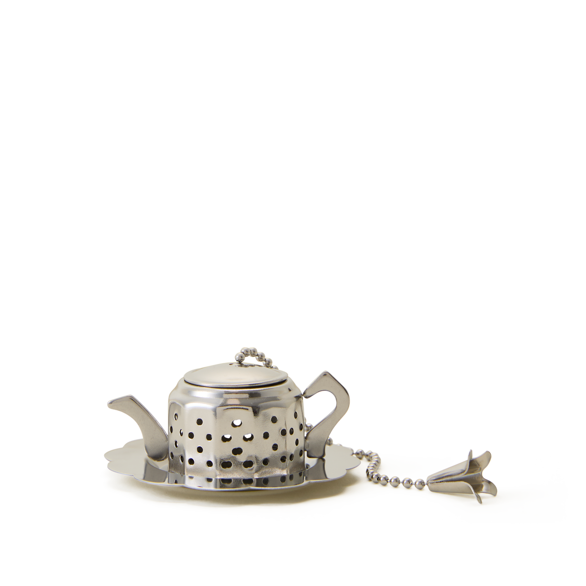 The Tea Party Infuser is shaped like a miniature teapot and comes with a matching saucer, featuring a chain with a decorative charm attached to the lid. Its small holes are perfect for steeping your favorite loose leaf tea.