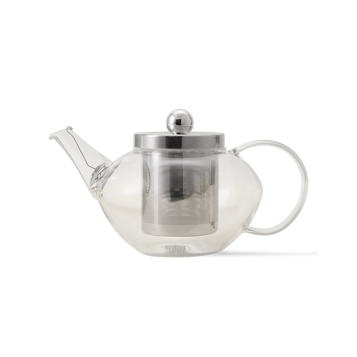 Clear glass teapot with a round body, metal infuser, and metal lid with a round handle, shown on a white background.