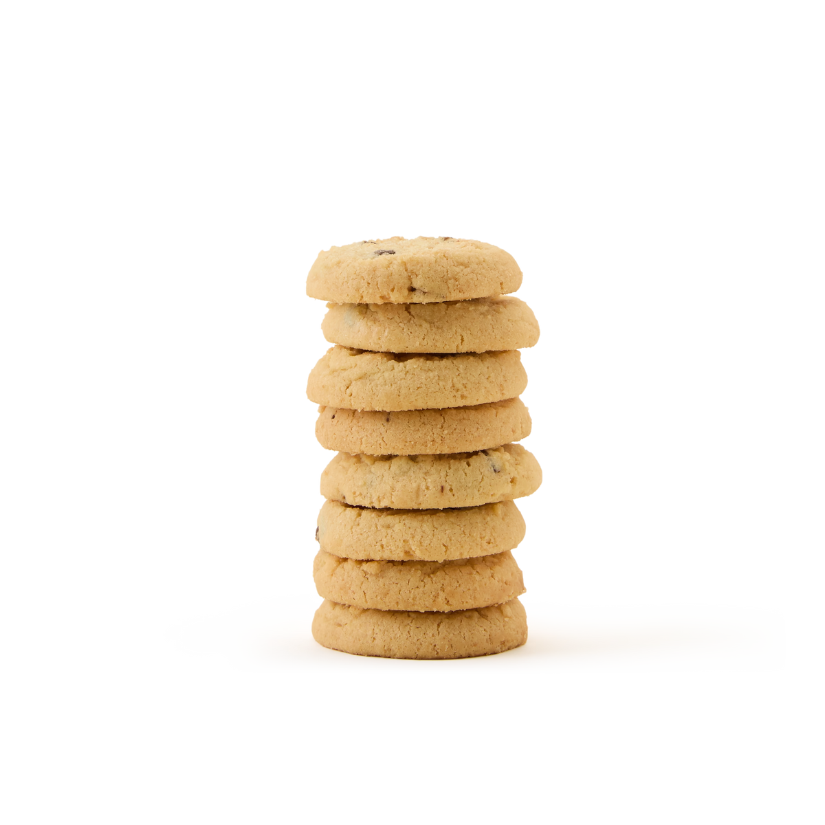A stack of eight round, golden brown All Butter Chocolate Chip Shortbread cookies is arranged neatly on a white background, making a perfect pairing with English Breakfast tea.
