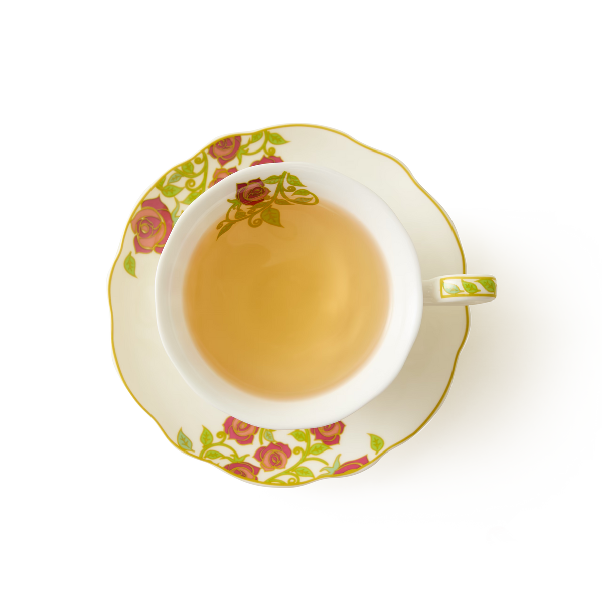 A cup of light tea viewed from above in the English Rose Tea Cup and Saucer, crafted from fine bone china and adorned with a delicate pattern of red roses and green leaves on a white background, evokes the timeless elegance of classic floral tea settings.