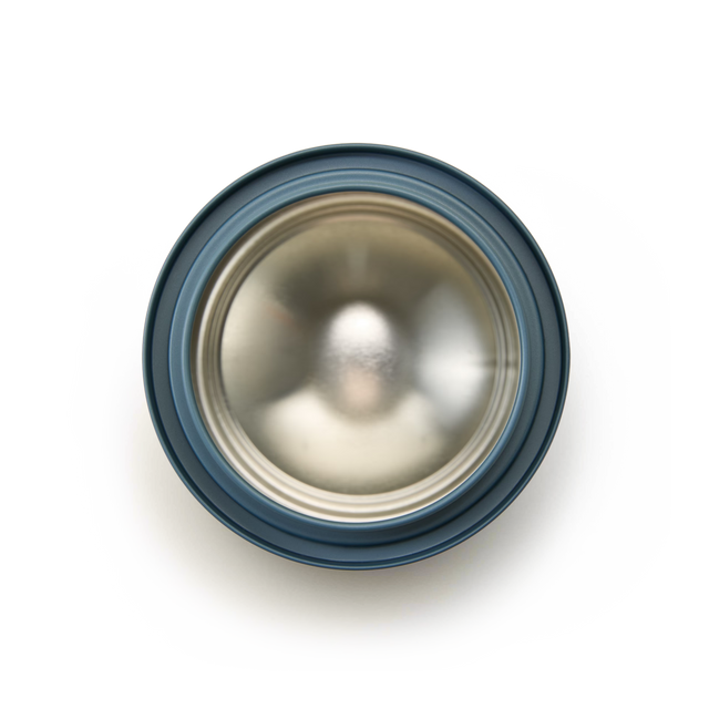A top-down view of an empty Fill-Me-Up Blue Caddy, a stainless steel insulated cup with a blue rim, placed on a white background.