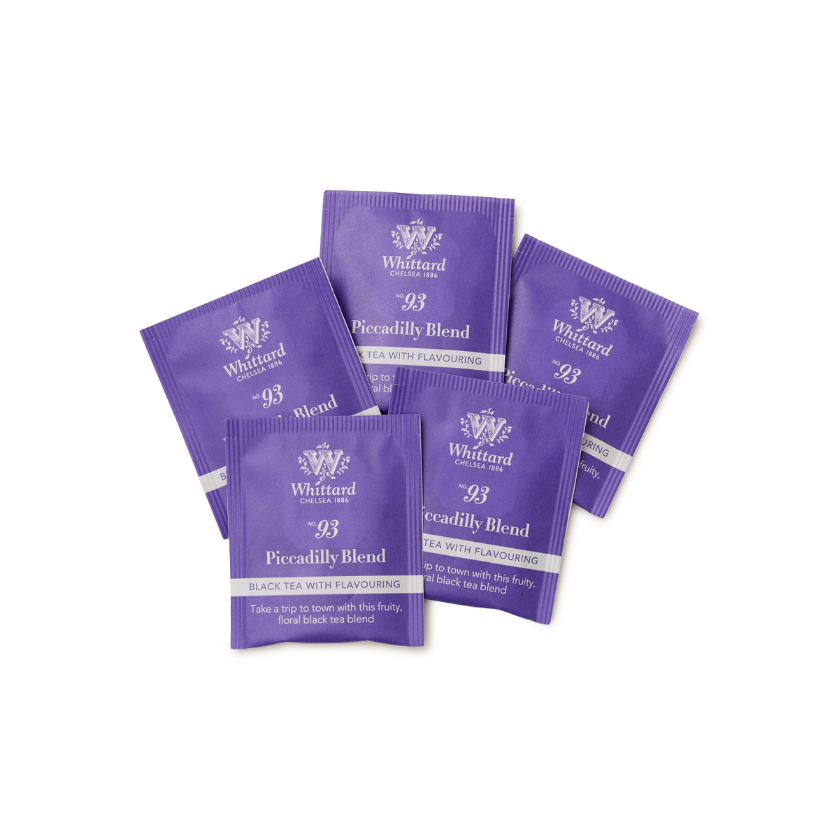 Five purple tea sachets labeled Whittard 93 Piccadilly Blend Black Tea with Flavouring are arranged in a fan shape on a white background.