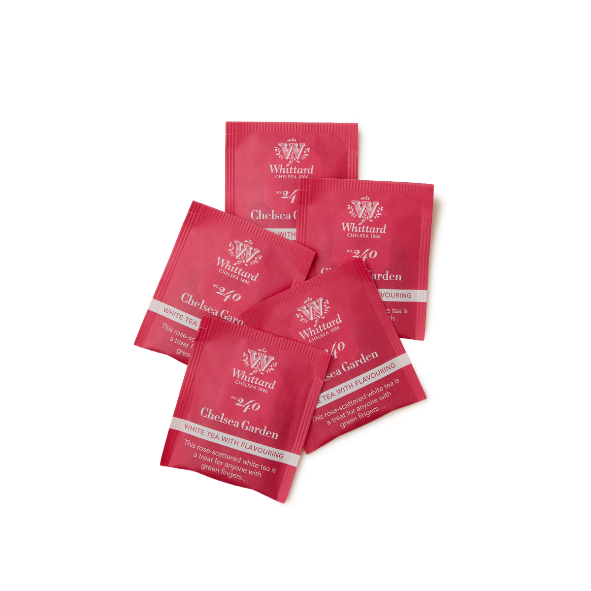 Five red tea sachets labeled Whittard Chelsea Garden are arranged in a scattered pile on a white background.