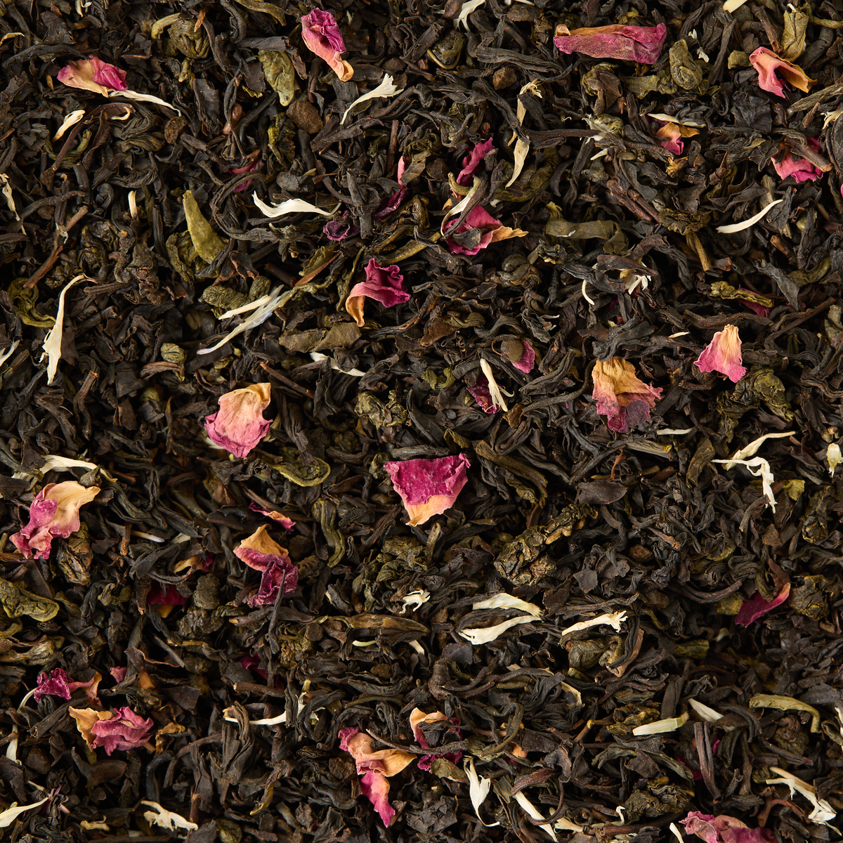 Afternoon Tea Loose Leaf Tea features dark, dried Chinese black tea leaves blended with delicate pink rose petals and white flower petals, creating a vibrant and natural mix—ideal for an elegant afternoon tea experience.