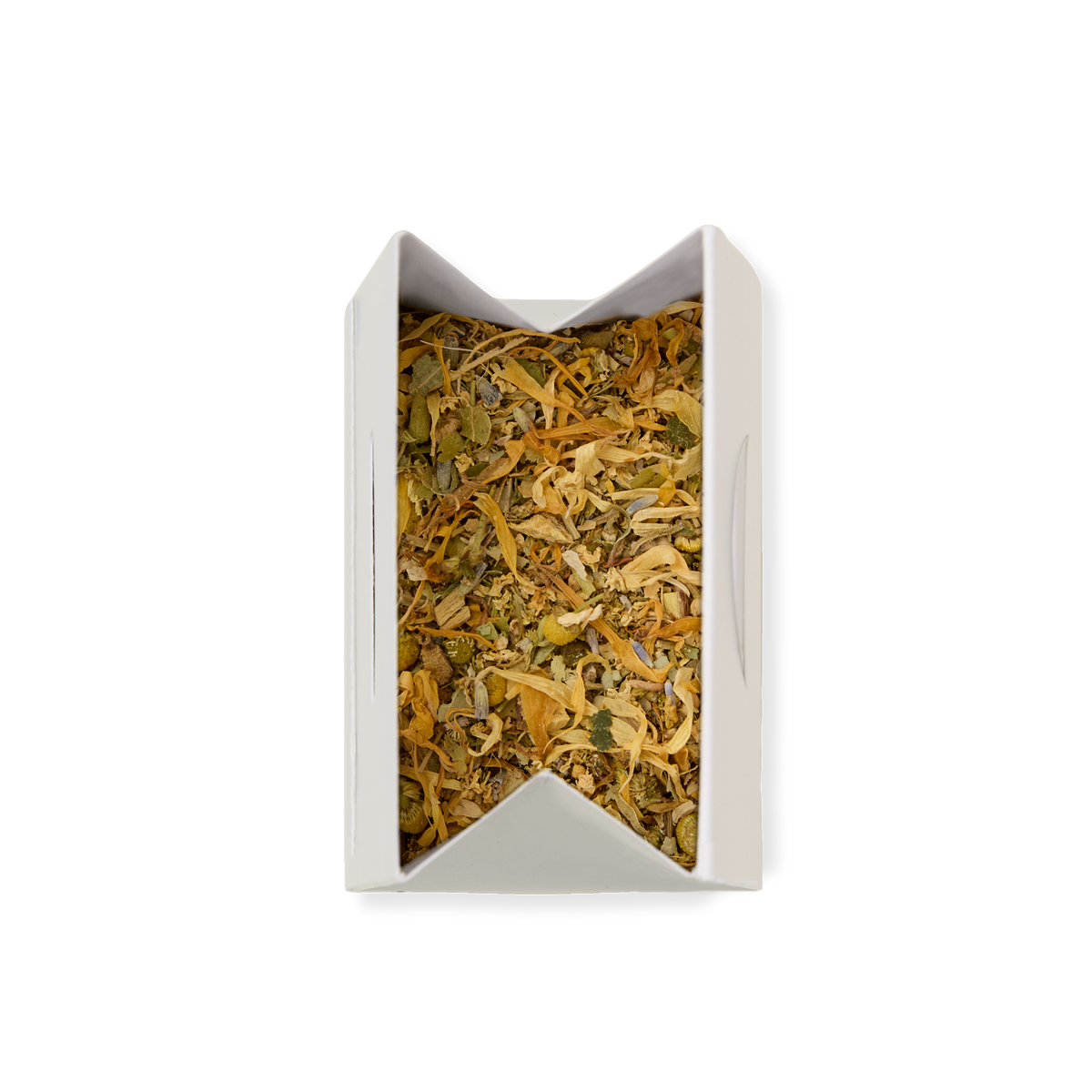 A white rectangular container with a V-shaped opening holds Elderflower & Apple Loose Infusion, a blend of dried herbs and flowers in green, yellow, and brown shades. The background is plain white.