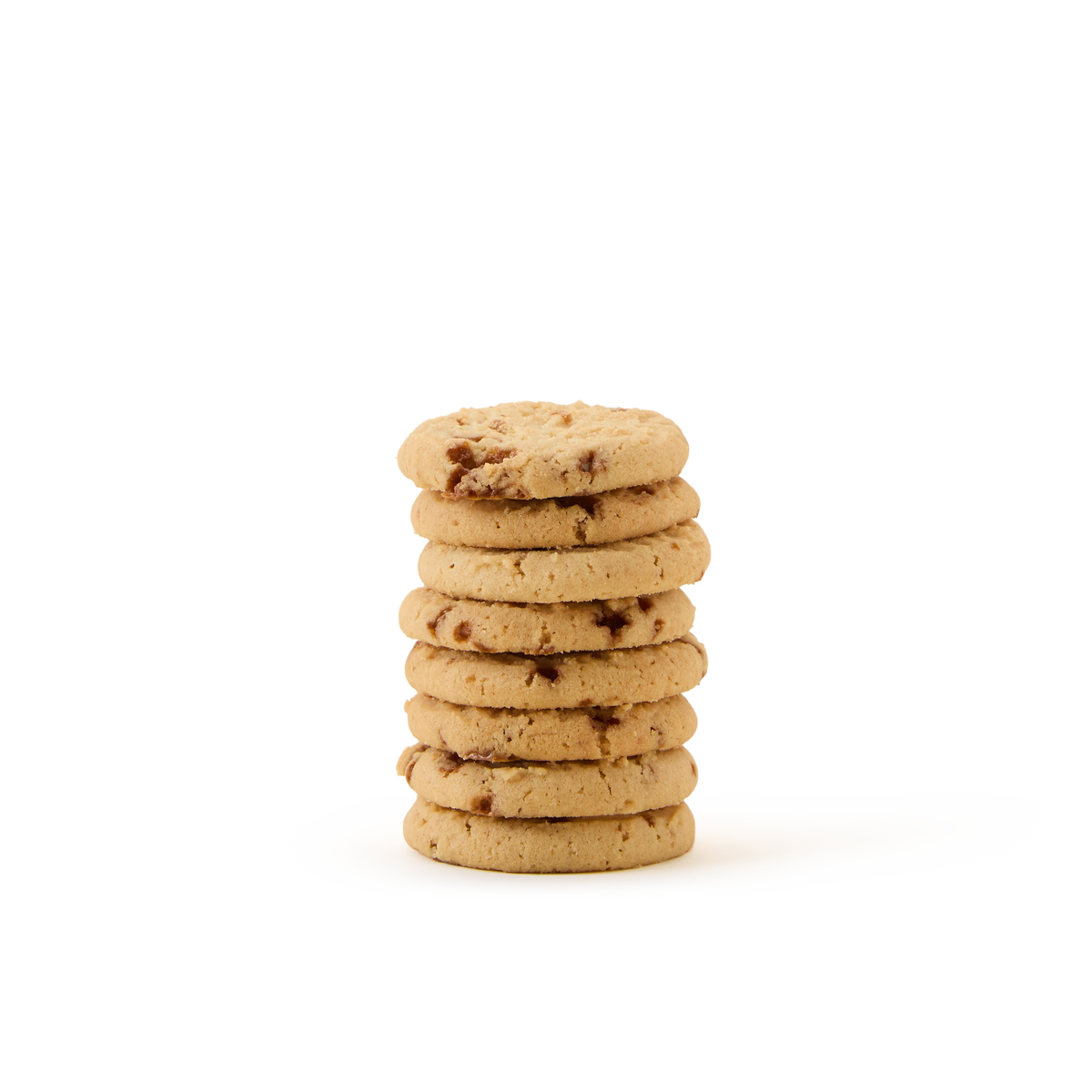 A stack of six Salted Caramel Biscuits is arranged neatly on a plain white background.