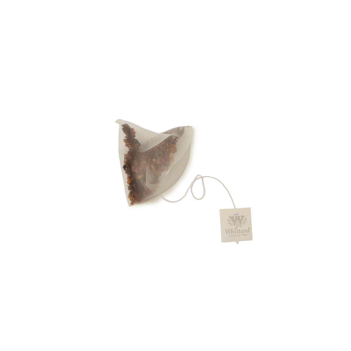 A single pyramid-shaped Cold Brew Watermelon, Strawberry and Lime Infusion teabag with a string and a square tag labeled Whittard, set against a white background.