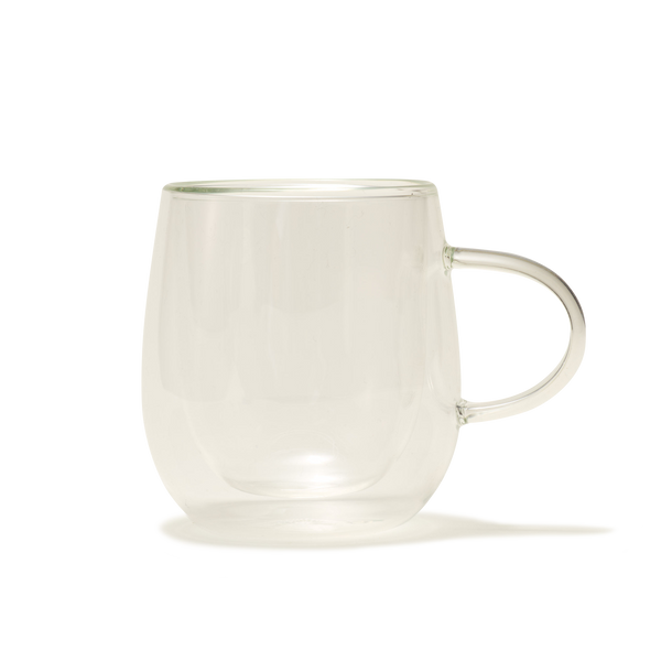 The Nova Double-Walled Mug, made of clear borosilicate glass with a handle, is displayed against a plain white background.