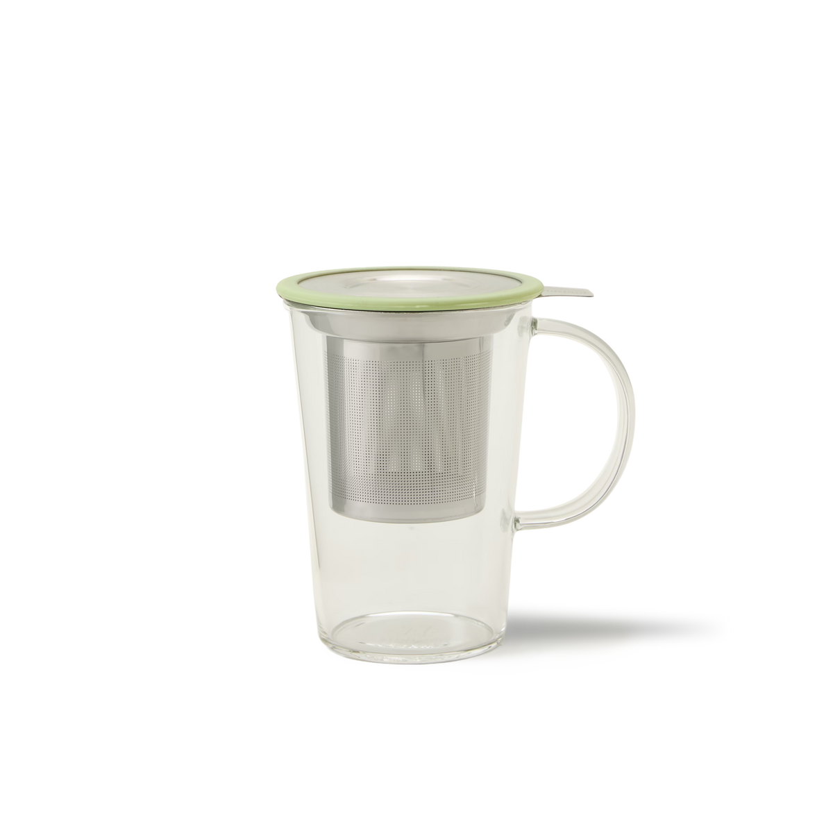 Pistachio Glass Pao Infuser Mug made of clear borosilicate glass with a stainless steel tea infuser basket and a light green lid.