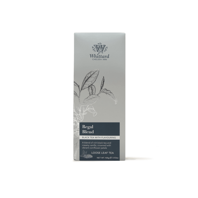 A box of Regal Blend Loose Leaf Tea, adorned with a silver gradient design and a tea leaf illustration alongside product details on the front—offering the perfect British tea experience with subtle notes of Madagascan vanilla.