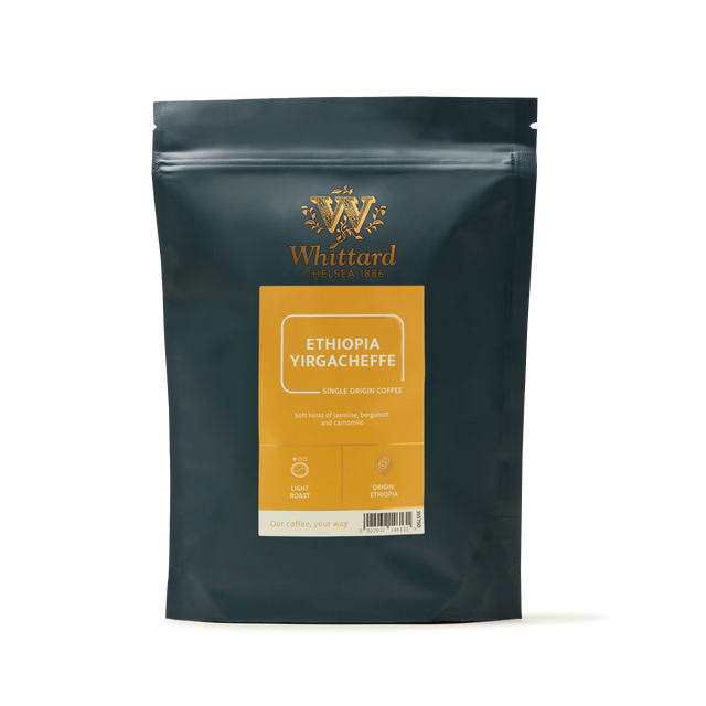 A dark blue bag of Ethiopia Yirgacheffe Coffee with gold and white text, offering tasting notes of jasmine, bergamot, and citrus. This light roast highlights the vibrant flavors typical of wild coffee from the renowned Yirgacheffe region.