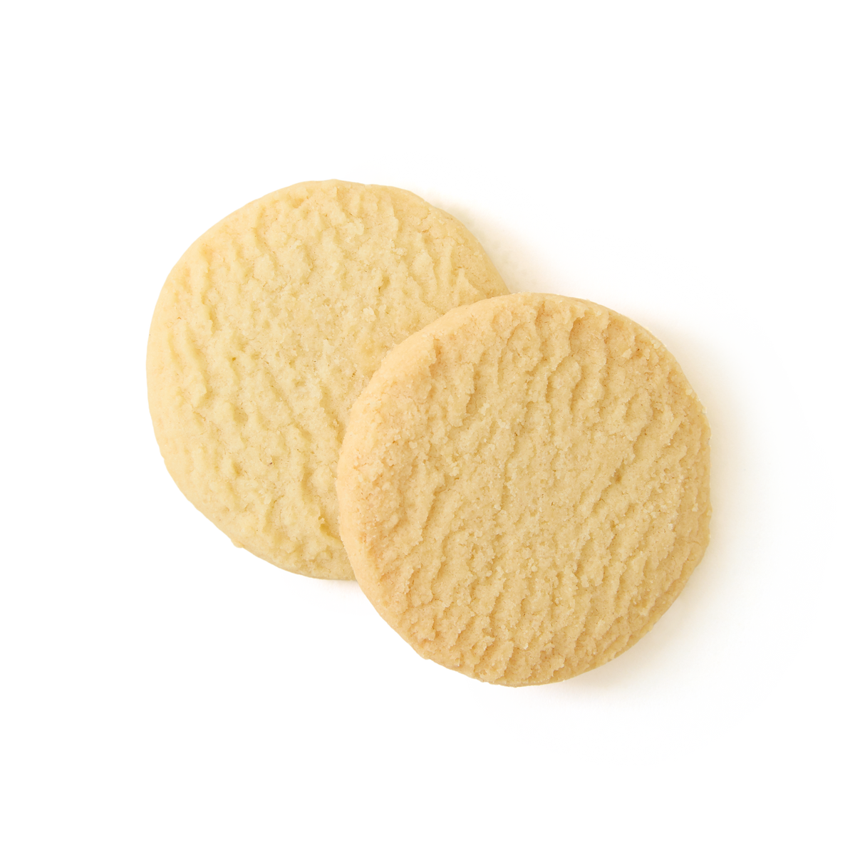 Two round, golden-brown All Butter Shortbread cookies with a slightly crumbly texture, reminiscent of traditional biscuits, are placed overlapping on a plain white background.