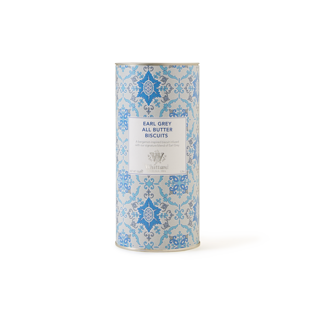 A cylindrical tin featuring an ornate blue and white design and labeled “Earl Grey All Butter Biscuits” contains biscuits made in the UK, delicately infused with tea flavor for a delicious taste, photographed against a plain white background.