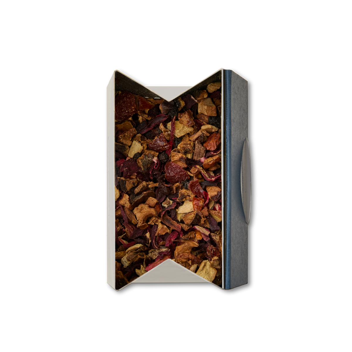 A rectangular box with a window reveals Berry Elixir Loose Infusion—a vibrant mix of dried tea leaves and fruit pieces in red, brown, and orange hues—set against a white background.