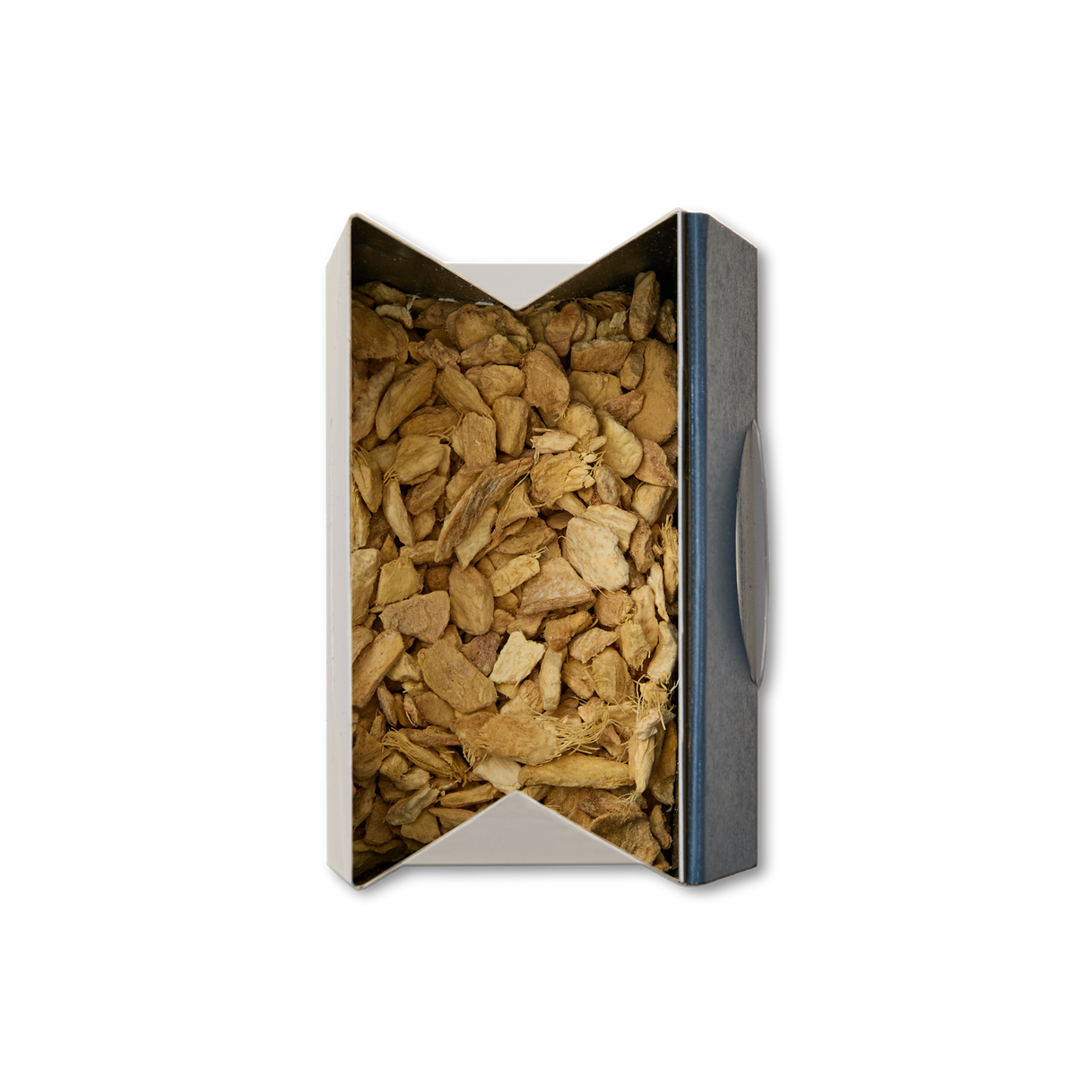 A plain white background showcases an open box of Pure Ginger Loose Infusion, filled with irregularly shaped pieces of dried ginger viewed from above.