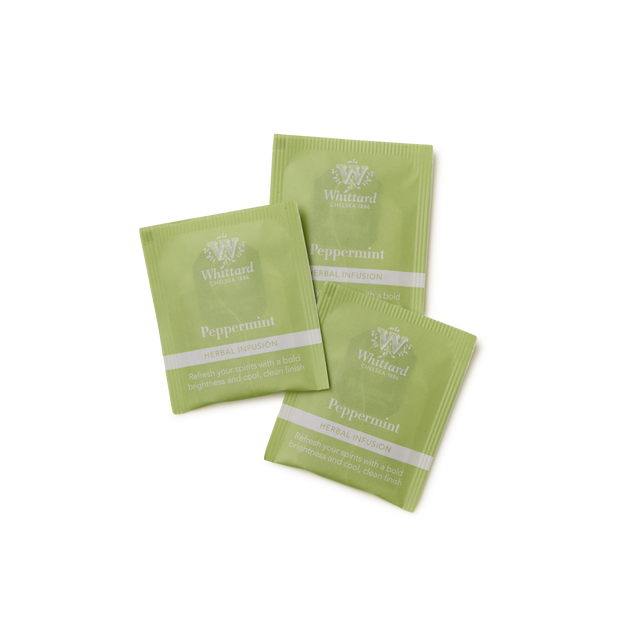 Three green Peppermint Infusion Teabags are arranged on a white background, each displaying the brand name, flavor, and a brief description in white text.