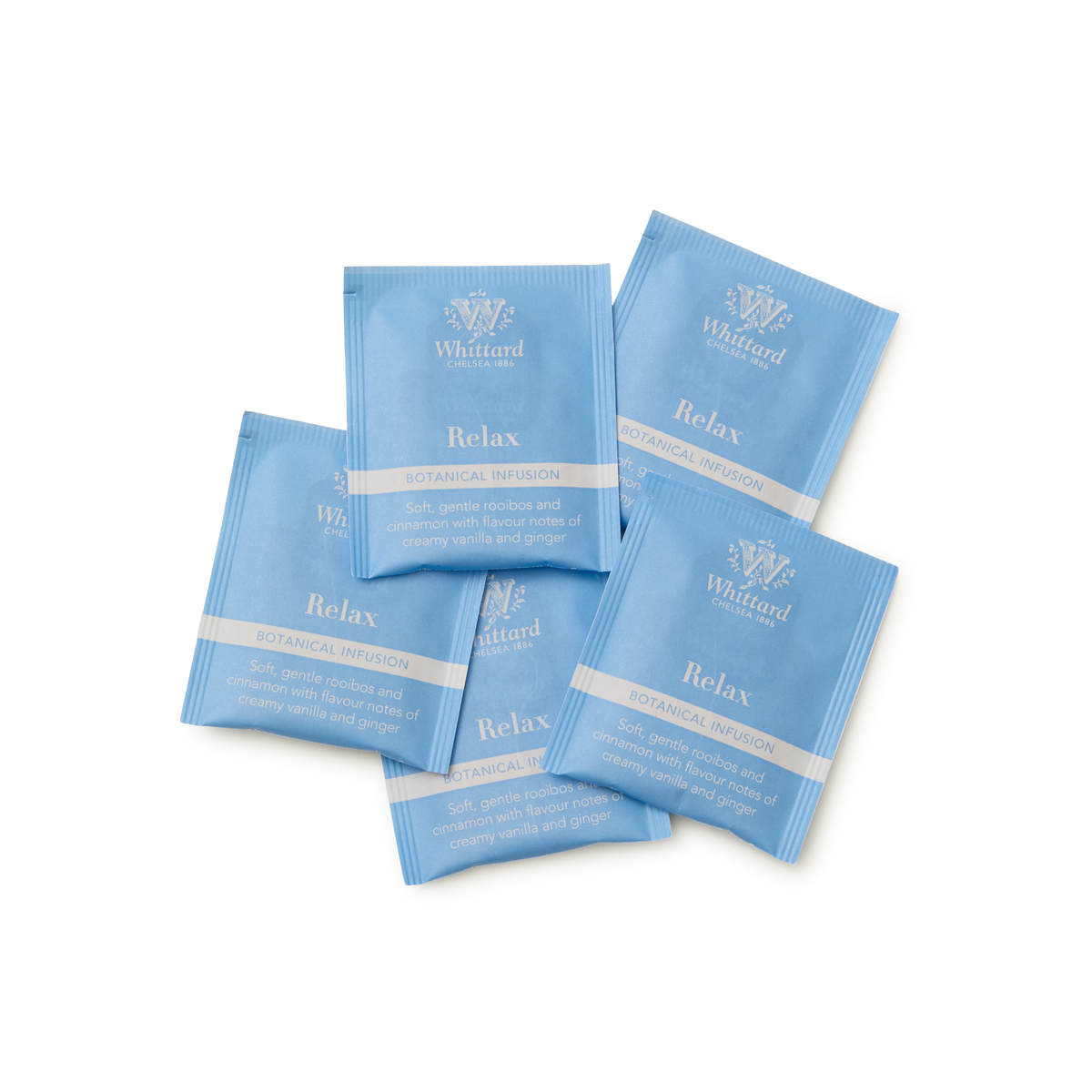 Five overlapping blue Relax Botanical Wellness Infusion Teabags from Whittard are shown, described as a calming herbal tea blend with soothing rooibos and creamy vanilla flavors, complemented by delicate notes of ginger.