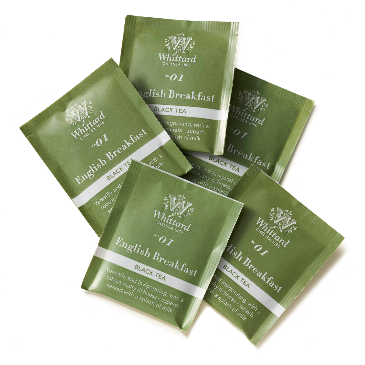 Five green Tea Discoveries English Breakfast Individually Wrapped Teabags are arranged in a fan shape on a white background.