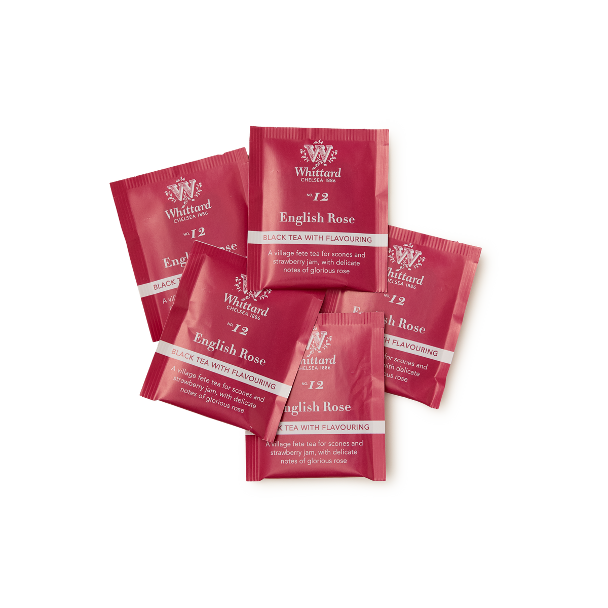 Five red sachets of Tea Discoveries English Rose Teabags, adorned with white and silver text and rose illustrations, are arranged overlapping on a white background—a beautiful floral infusion ideal for fans of rose-flavored tea.