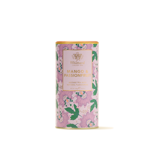 A cylindrical tin of Mango & Passionfruit Flavour Instant Tea, adorned with a vibrant floral label in shades of pink, green, and gold, set against a plain white background. This tropical blend offers an irresistible combination of mango and passionfruit flavours for a refreshing tea experience.