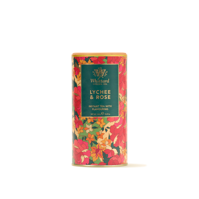 A cylindrical tin of Lychee & Rose Instant Tea, adorned with a vibrant floral design and featuring a green label on the front, delivers the refined flavors of lychee and rose in each fruity cup.