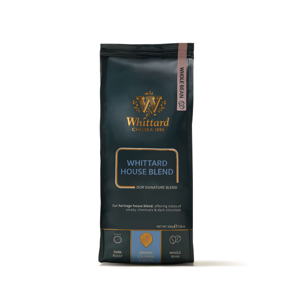 A 200g Whittard House Blend Coffee Beans Valve Pack, presented in gold and blue packaging, is labeled as a dark roast with Colombian origins. This house blend features tasting notes of smoky chestnuts and dark chocolate, emphasizing the rich flavors typical of Colombian coffee.