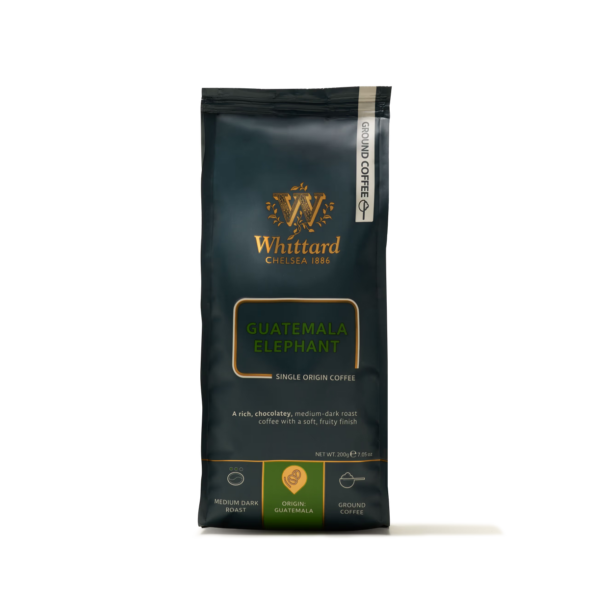 A 200g bag of Whittard Guatemala Elephant Ground Coffee Valve Pack, made from large coffee beans cultivated near Lake Atitlán, featuring gold and green labeling. The packaging displays medium dark roast icons and product details on a dark background.