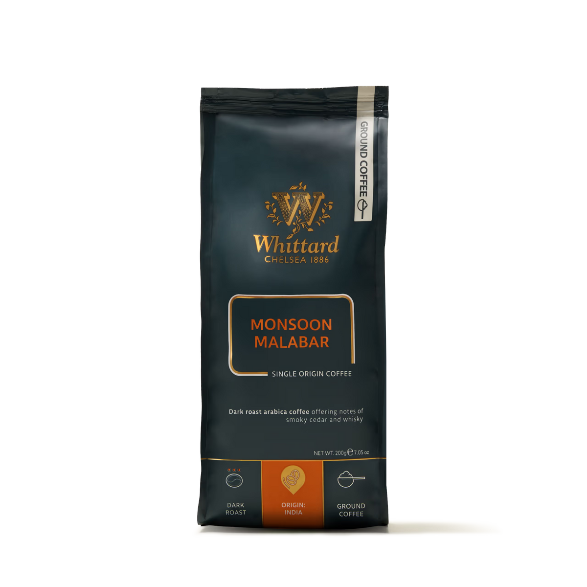 A bag of Monsoon Malabar Ground Coffee Valve Pack, a dark roast single origin Indian coffee, presented in black packaging with orange and gold accents and coffee details on the front.