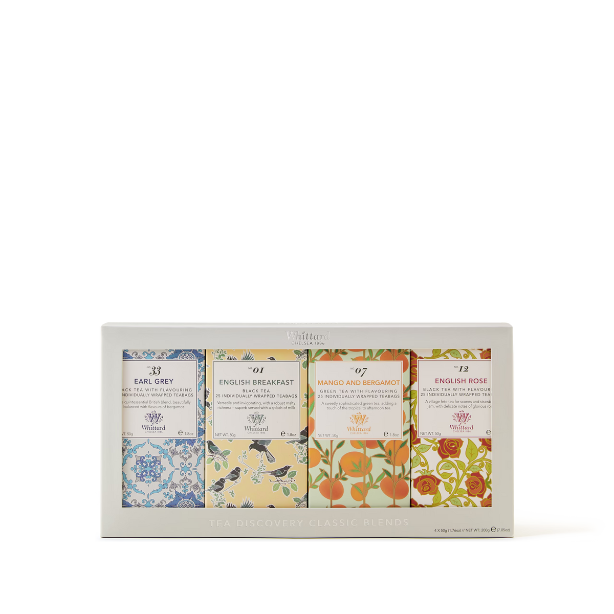 A boxed set of four Whittard tea blends, each in colorful floral packaging: Earl Grey, English Breakfast, Mango and Bergamot, and English Rose. The box is labeled Tea Discovery Classic Blends..