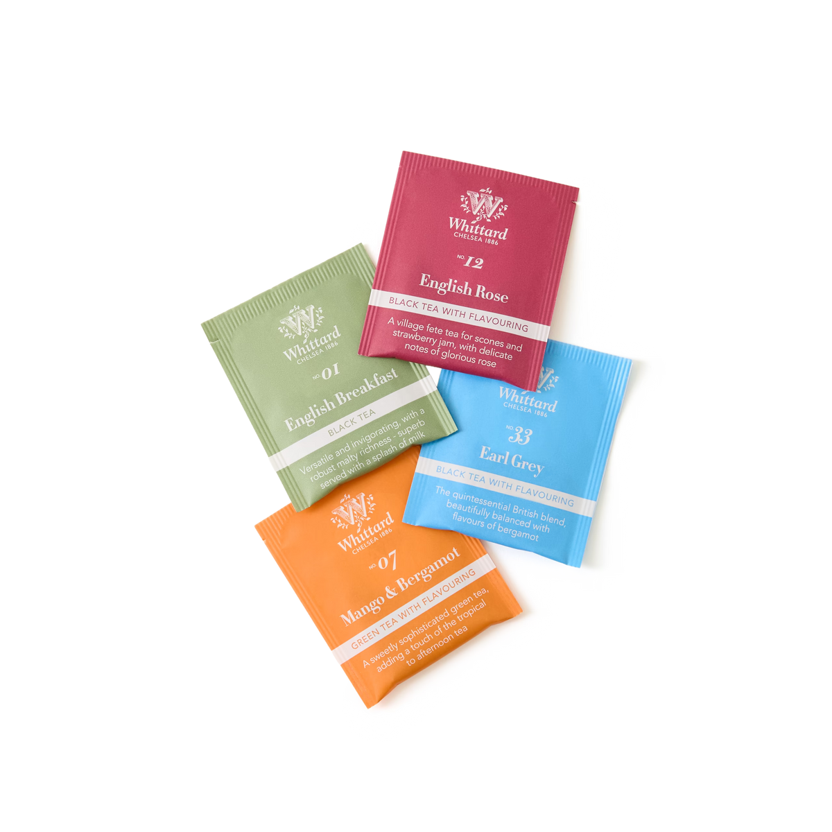 Four colorful Whittard tea sachets (English Rose, English Breakfast, Earl Grey, Mango & Bergamot) are arranged in a scattered pattern on a white background.