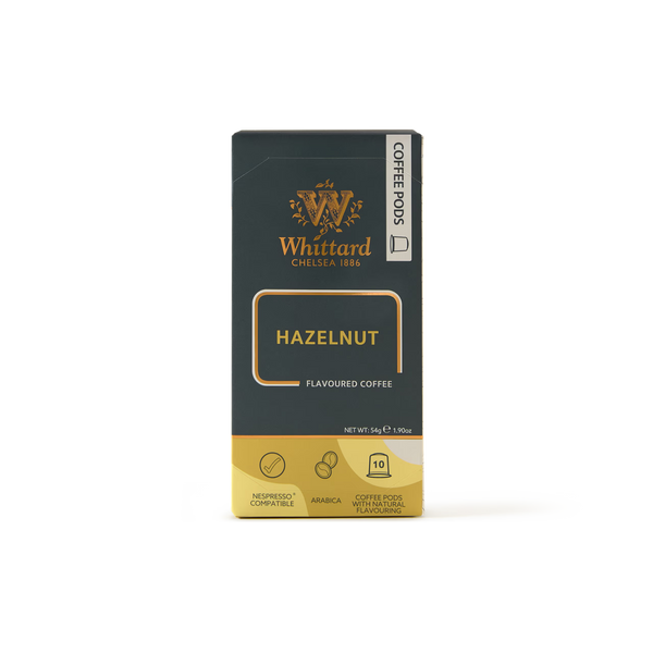 A box of Hazelnut Nespresso Compatible Coffee Pods, featuring 10 pods in elegant dark green packaging with gold accents, each offering a rich hazelnut flavour in every cup.
