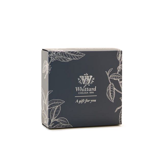 A dark grey “2 Tub Gift Box Blue” from Whittard of Chelsea, featuring white botanical illustrations and the text “A gift for you” on the front, displayed against a plain white background.