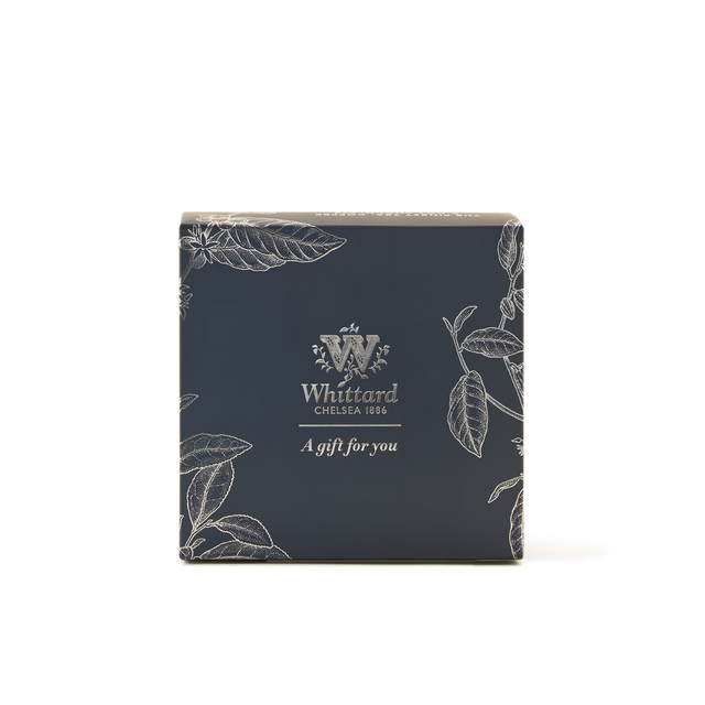 A 2 Tub Gift Box Blue from Whittard Chelsea 1886, featuring navy blue packaging adorned with white floral illustrations and the words “A gift for you” on the front, set against a plain white background.