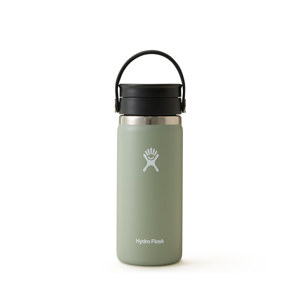 An Agave Hydro Flask Travel Mug with a black, leakproof Flex Sip Lid and a convenient carrying handle is shown upright against a plain white background. The mug features double-wall vacuum insulation, with the Hydro Flask name and logo displayed prominently on the front.