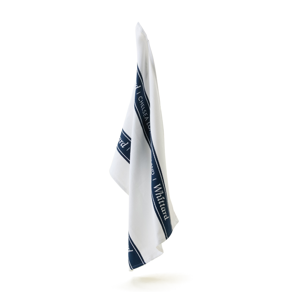 A white cloth hangs vertically, featuring navy blue stripes and text along the borders, displayed against a plain white background.