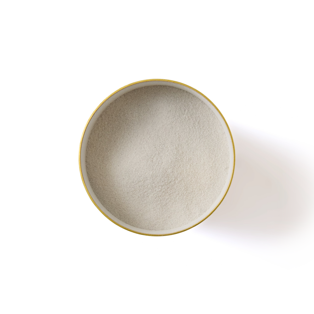 A round yellow bowl filled with a fine, off-white powder—Blueberry Cheesecake Flavoured Hot Chocolate—is viewed from above, set against a plain white background.