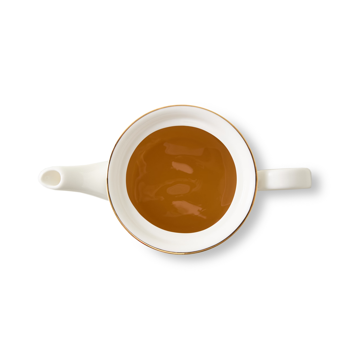 White teacup with a handle and side spout filled with brown tea, viewed from above, on a plain white background.