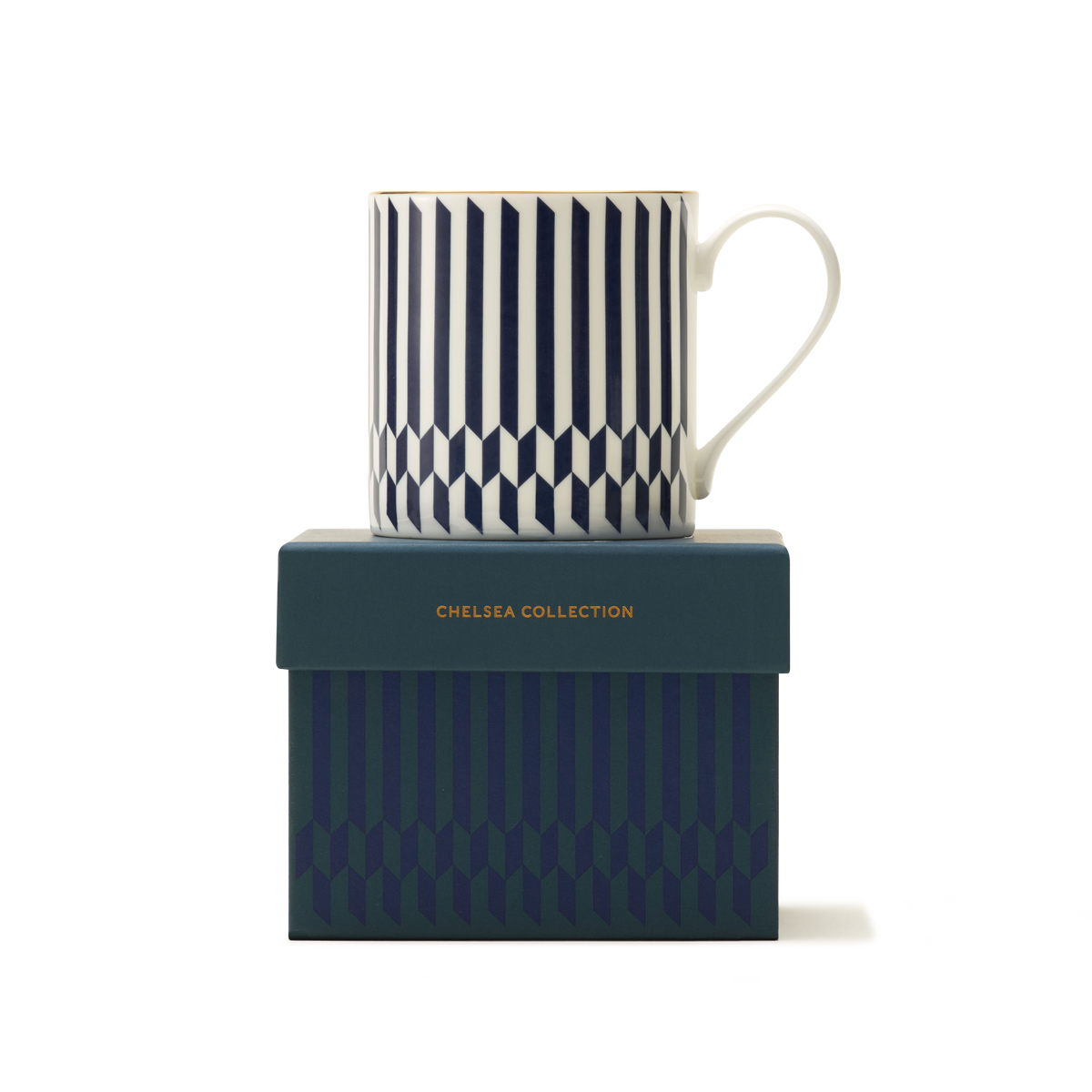 The Sloane Mug, a white luxury mug adorned with a navy blue and white chevron-stripe pattern, is elegantly presented on a matching teal gift box embossed with CHELSEA COLLECTION in gold lettering. Highlighting British craftsmanship, both the mug and the box display geometric vertical designs set against a crisp white backdrop.
