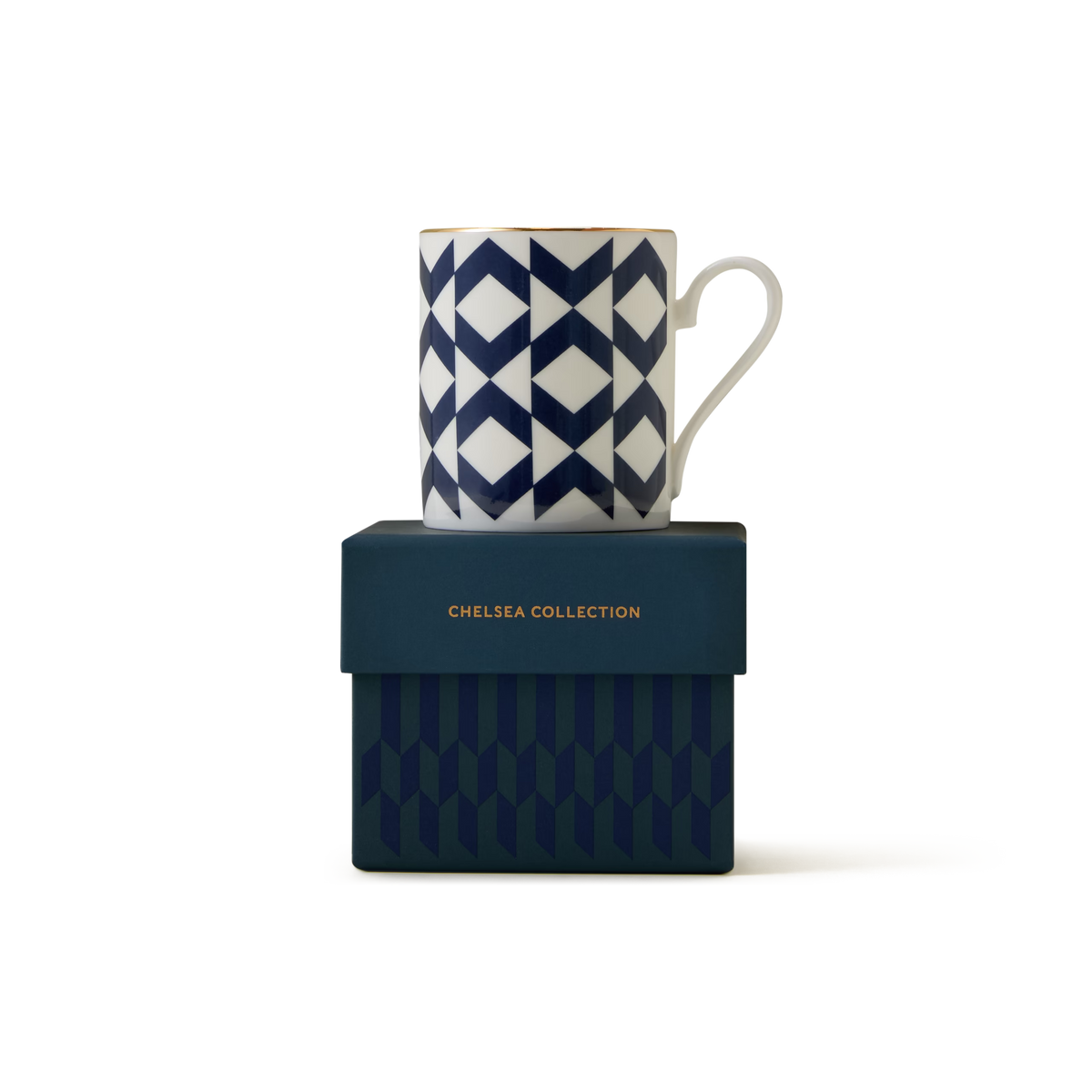 The Regency Espresso Cup rests atop a dark blue box adorned with subtle geometric designs and “CHELSEA COLLECTION” written in gold text. Hand-finished in England, this ceramic espresso cup displays a sophisticated blue and white geometric pattern accented with elegant 22ct gold detailing.