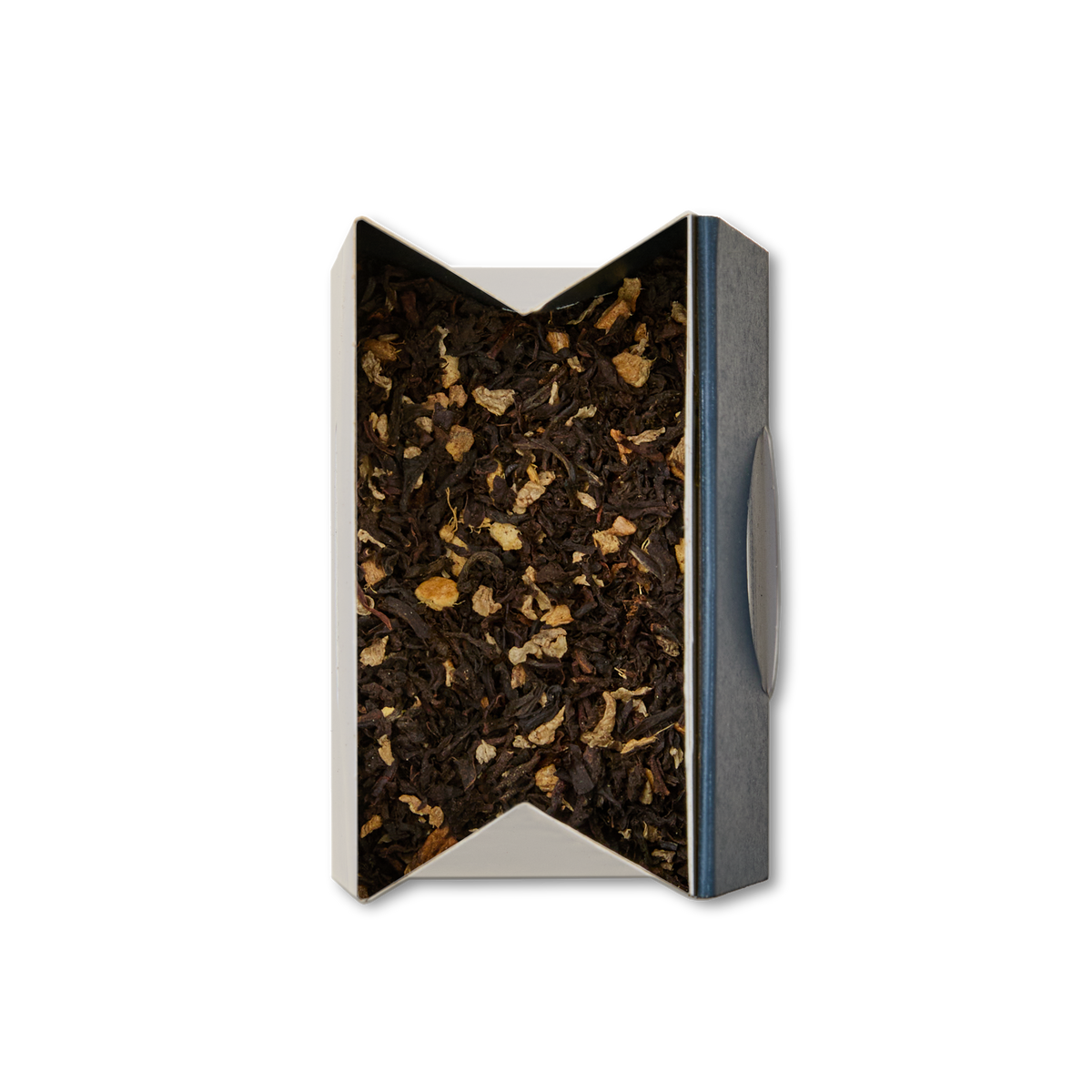 A rectangular box of Ginger Chai Loose Leaf Tea, opened to show a blend of black tea and small dried ginger pieces, viewed from above against a white background—a true winter warmer.