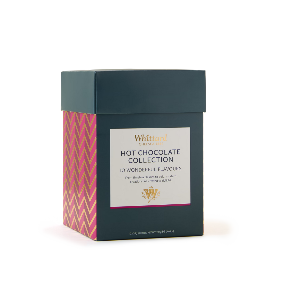 A box of the Hot Chocolate Collection features a dark blue lid and a base decorated with pink and gold zigzag patterns, labeled as containing 10 wonderful flavours. This luxury hot chocolate gift set is ideal for anyone looking to enjoy or share distinctive chocolate flavours.