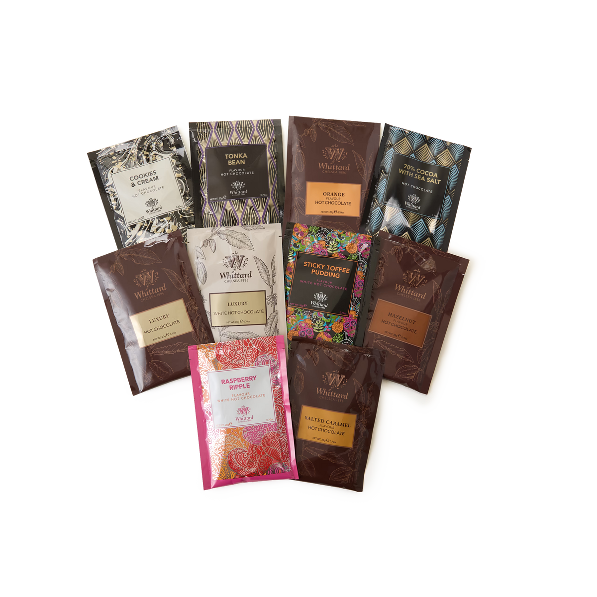 Ten sachets from the Hot Chocolate Collection are arranged in a semicircle on a white background. Each sachet showcases a unique flavor and vibrant packaging, making this set a delightful celebration of distinctive chocolate flavours.